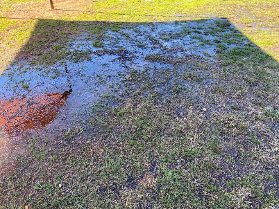 No kickball or football today on the Powell Elementary playground after water muddied the surface. 
May 2022
