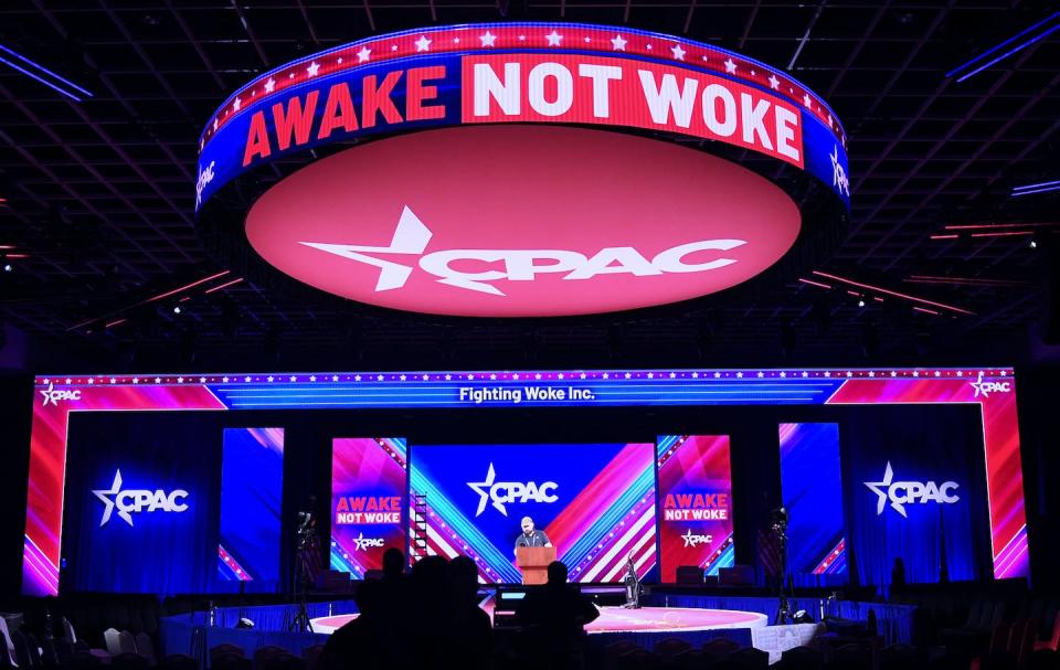 Workers prepare the stage for the 2022 meeting of the Conservative Political Action Conference in Orlando, Fla. <a href="https://www.gettyimages.com/detail/news-photo/workers-prepare-the-stage-for-the-2022-meeting-of-the-news-photo/1238715739?phrase=desantis%20woke%20florida&adppopup=true" rel="nofollow noopener" target="_blank" data-ylk="slk:Paul Hennessy/SOPA Images/LightRocket via Getty Images;elm:context_link;itc:0;sec:content-canvas" class="link ">Paul Hennessy/SOPA Images/LightRocket via Getty Images</a>