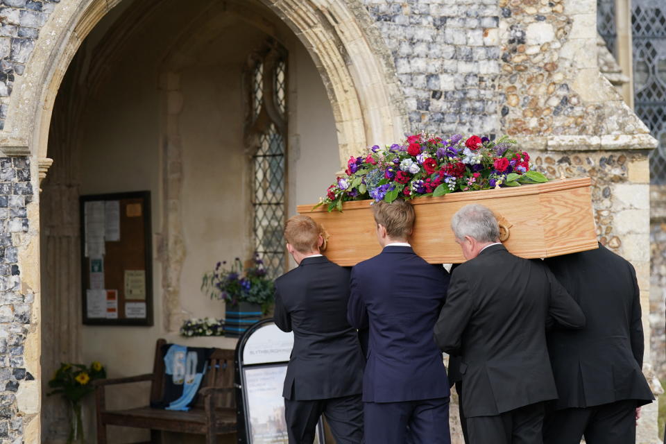 EDITORS NOTE NO CROPPING - IMAGE MUST BE USED AS RECEIVED Pallbearers carry the coffin of TV presenter and journalist Bill Turnbull into Holy Trinity Church in Blythburgh, Suffolk for his funeral. Picture date: Friday September 16, 2022.