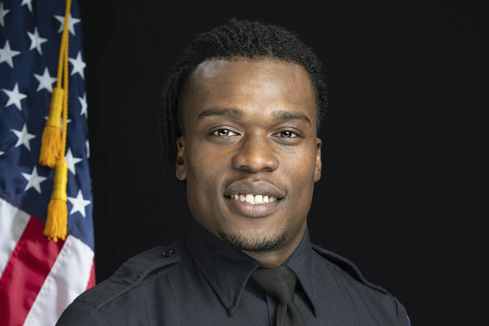 FILE - This undated file photo provided by the Wauwatosa Police Department in Wauwatosa, Wis., shows Wauwatosa Police Officer Joseph Mensah. Mensah, a police officer in a Milwaukee suburb who resigned after being involved in his third fatal shooting in five years, has been hired as a sheriff’s deputy. Waukesha County Sheriff Eric Severson said Tuesday, Jan. 26, 2021, that he hired Mensah after an extensive review that found his use of force was proper in all three shootings. (Gary Monreal/Monreal Photography LLC/Wauwatosa Police Department via AP, File)