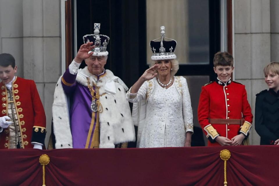 <div class="inline-image__caption"><p>Britain's King Charles and Queen Camilla wave on the Buckingham Palace balcony following their coronation ceremony in London, Britain May 6, 2023.</p></div> <div class="inline-image__credit">Clodagh Kilcoyne/Reuters</div>
