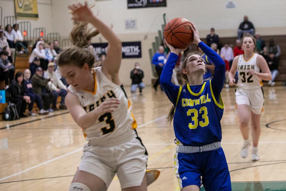 Conwell-Egan's Brooke Mcfadden drives to the basket. Conwell-Egan defeated York Catholic, 52-46, in the first round of the PIAA 3A girls' basketball tournament in York, Tuesday, March 8, 2022.