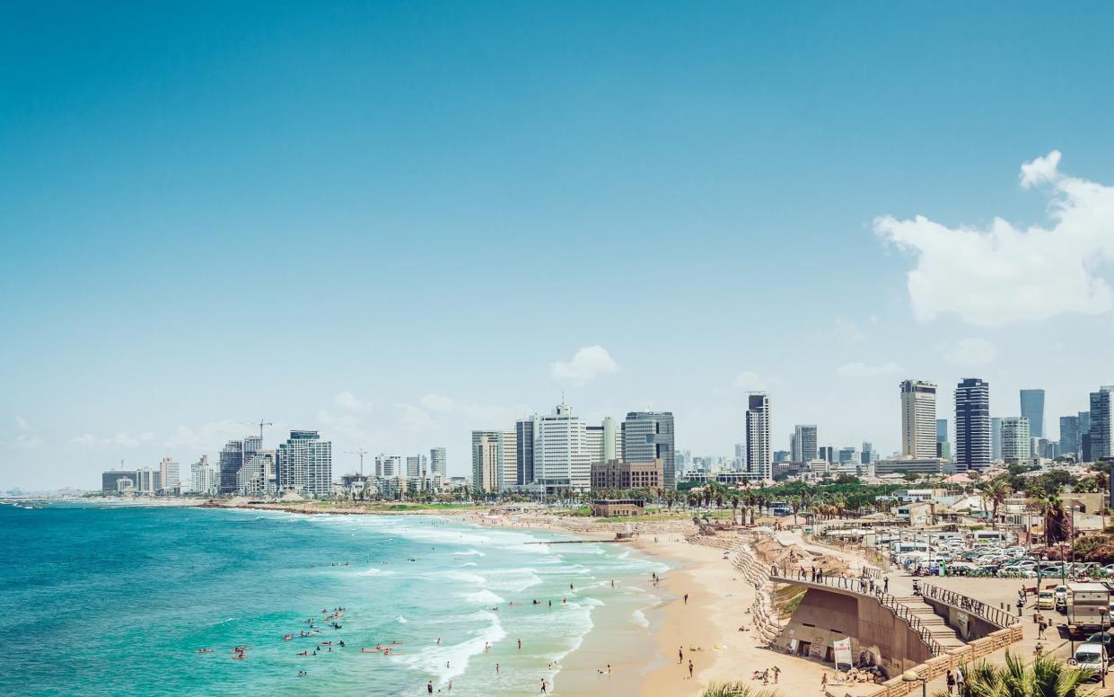 Panoramic view of Tel Aviv and Mediterranean Sea, travel to israel, what countries require a booster, are boosters mandatory for travel - Getty