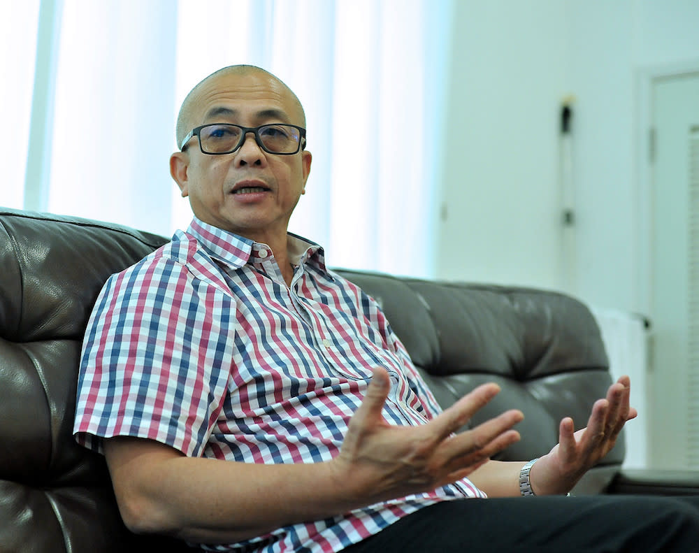 Labuan MP Datuk Rozman Isli addresses a press conference in Labuan December 11, 2019. — Bernama pic