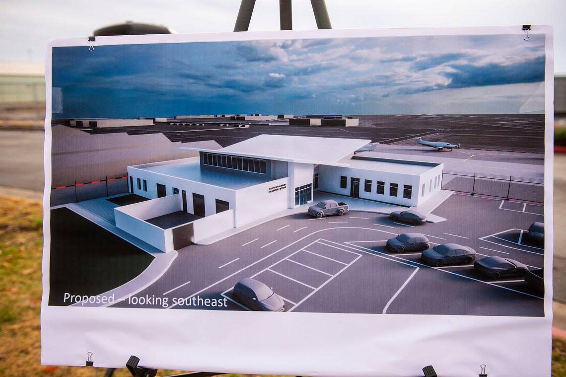 A rendering of a proposed $17 million terminal replacement project is displayed during a groundbreaking ceremony at the Merced Yosemite Regional Airport in Merced, Calif., on Thursday, Dec. 21, 2023. The project will include updates to the existing 1940s-era terminal as well as the construction of a new energy-efficient and sustainable facility.