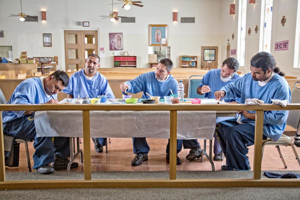 Peter Merts photos show California Prison Arts Programs Painting students in the Catholic chapel at Sierra Conservation Center - 2016