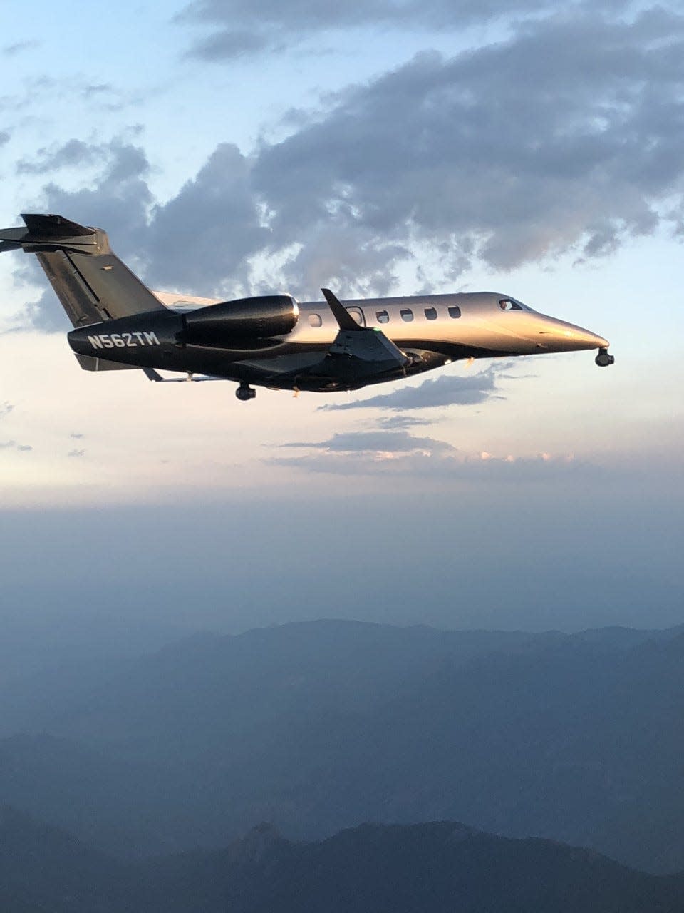 The specially outfitted Embraer Phenom 300E "camera ship" used to film "Top Gun: Maverick."