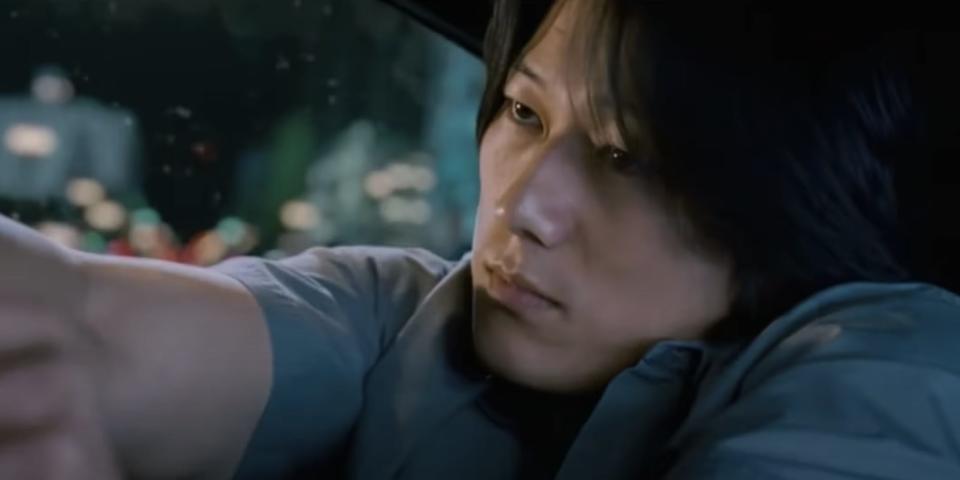 Han (Sung Kang) driving in The Fast and the Furious: Tokyo Drift before he's "killed"