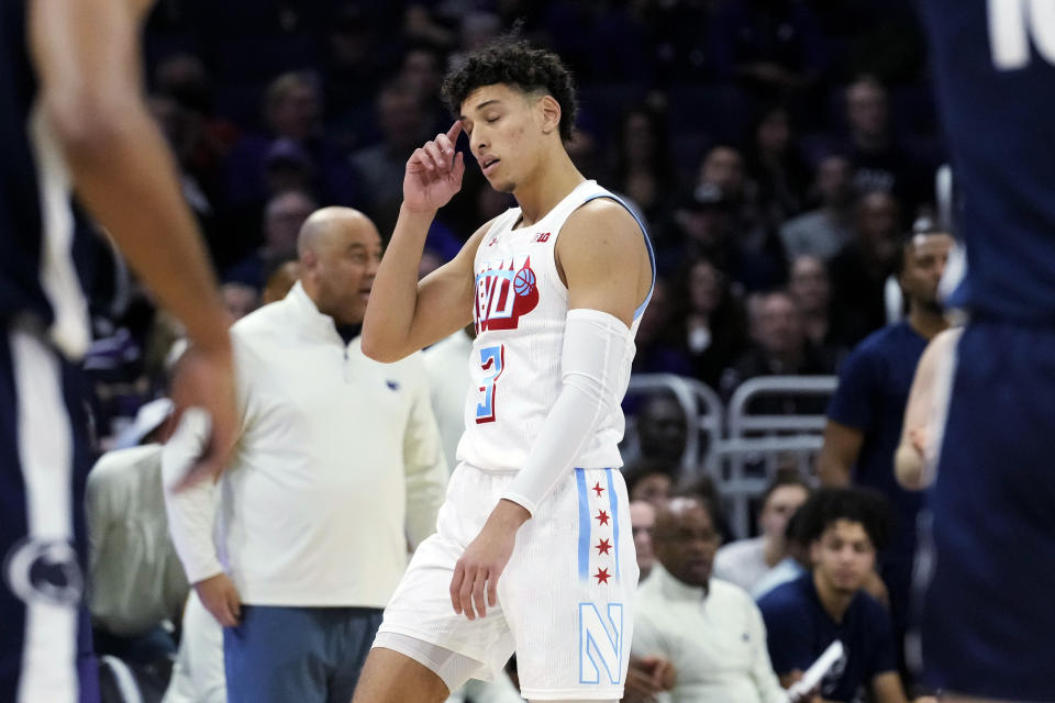 Northwestern guard Ty Berry reacts as he walks on the court during the second half of an NCAA college basketball game against Penn State in Evanston, Ill., Wednesday, March 1, 2023. Penn State won 68-65. (AP Photo/Nam Y. Huh)