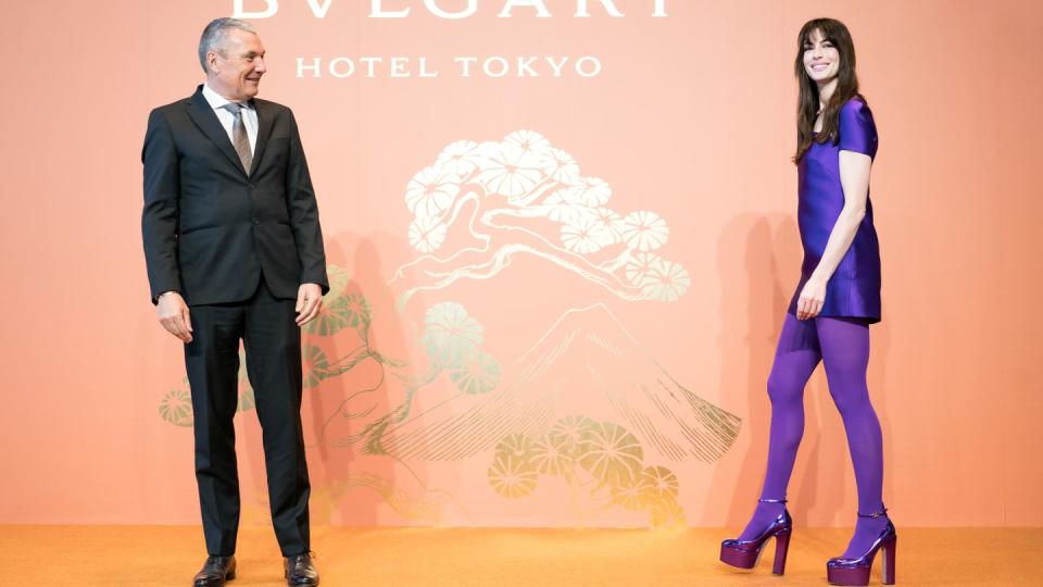 tokyo, japan april 04 bvlgari group ceo jean christophe babin l looks on as actress and bvlgari global ambassador anne hathaway r arrives for a press conference for the opening of bvlgari hotel tokyo in the tokyo midtown yaesu building on april 04, 2023 in tokyo, japan photo by tomohiro ohsumigetty images