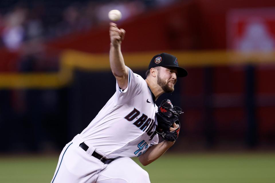PHOENIX, ARIZONA - AUGUST 27: Starter Slade Cecconi #43 of the Arizona Diamondbacks pitches against the Cincinnati Reds during the first inning at Chase Field on August 27, 2023 in Phoenix, Arizona. (Photo by Chris Coduto/Getty Images)