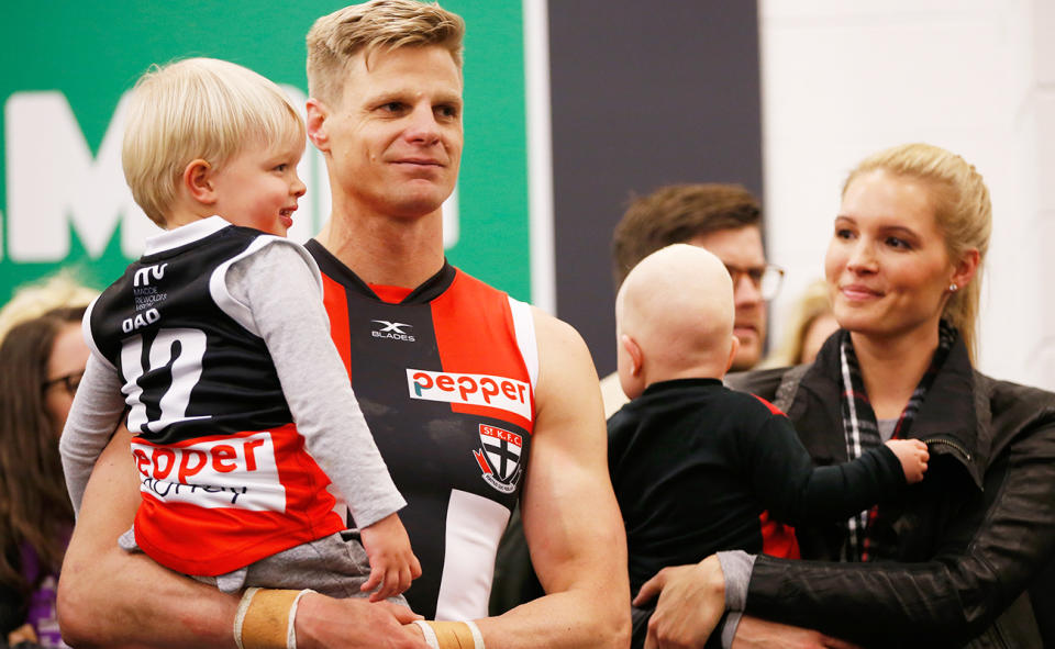 Nick Riewoldt, pictured here with his family after his last AFL game in 2017.