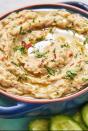 <p>We like our baba ghanoush GARLICKY. If you don't, skip grating the raw clove in at the end. Without it, you'll have a more subtle (slightly sweet) garlic flavour that will make everyone very, very happy.</p><p>Get the <a href="https://www.delish.com/uk/cooking/recipes/a29947311/baba-ghanoush-recipe/" rel="nofollow noopener" target="_blank" data-ylk="slk:Baba Ghanoush;elm:context_link;itc:0;sec:content-canvas" class="link ">Baba Ghanoush</a> recipe.</p>