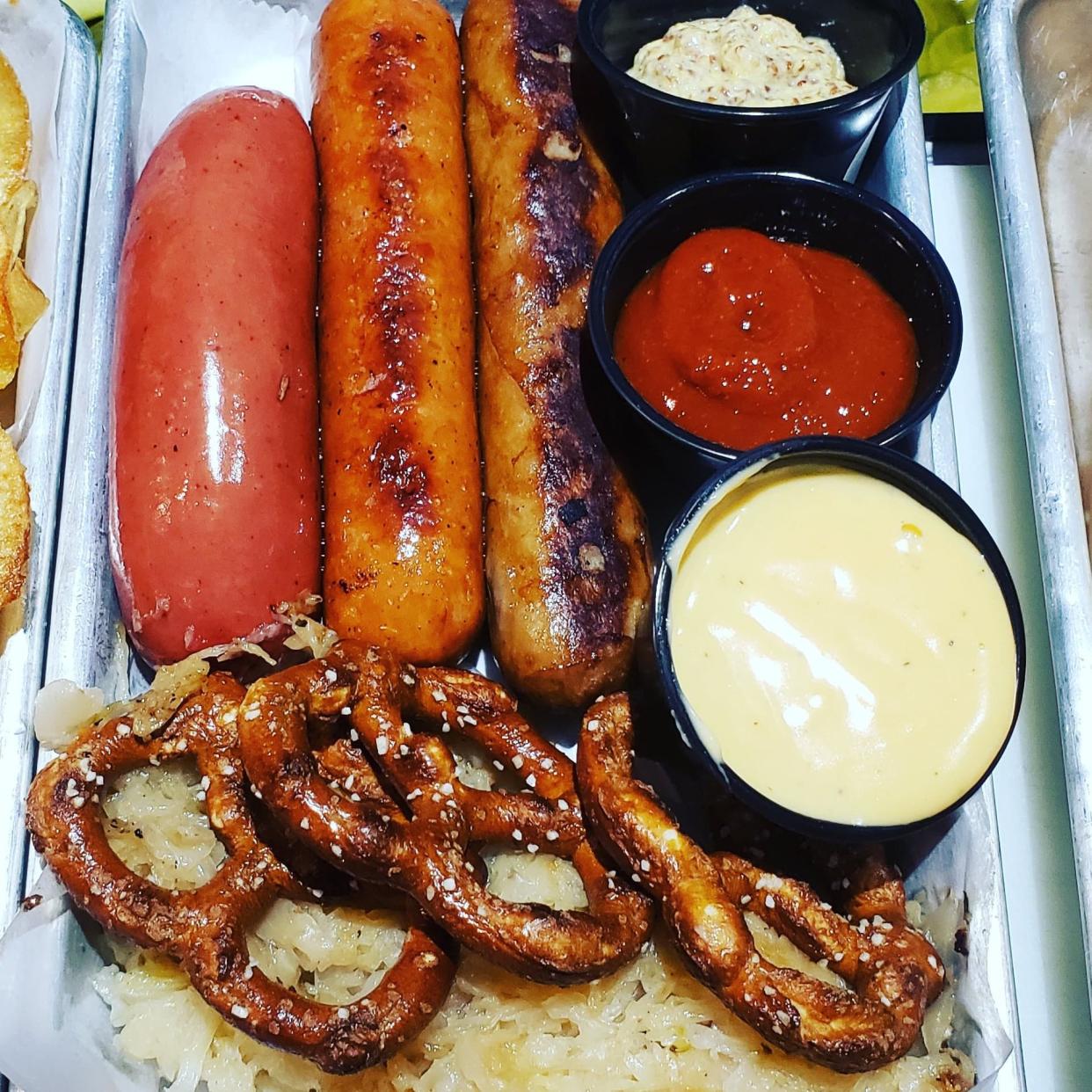 Bixenberg Tavern, a recently opened pub and restaurant in Germantown, has German-inspired food on its menu such as different kinds of sausage and Bavarian pretzels.