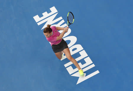 Tennis - Australian Open - First Round - Melbourne Park, Melbourne, Australia, January 15, 2019. Romania’s Simona Halep in action during the match against Estonia’s Kaia Kanepi. REUTERS/Kim Kyung-Hoon