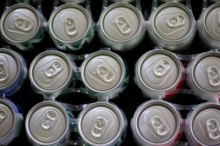 FILE PHOTO: Beer cans are displayed in a store in Ciudad Juarez, Mexico, July 31, 2018. REUTERS/Jose Luis Gonzalez/File Photo