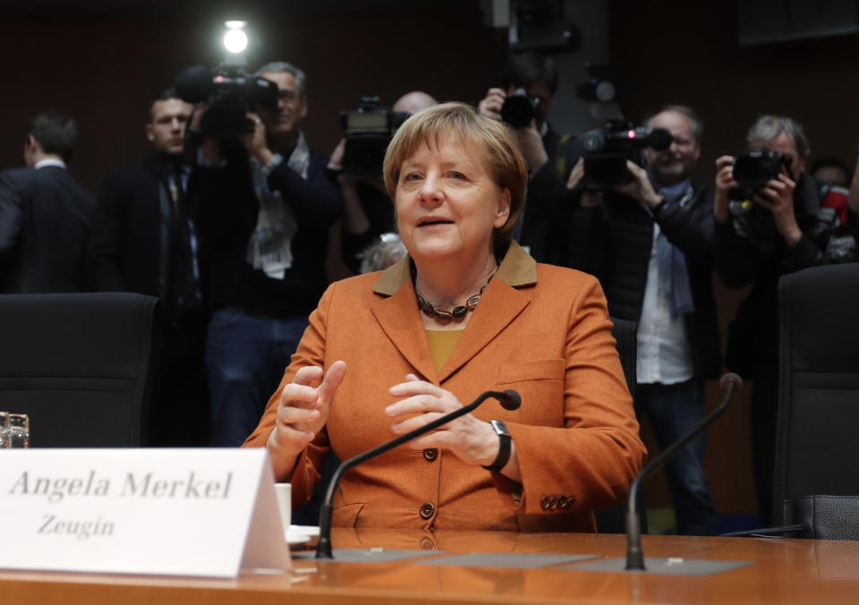 German Chancellor Angela Merkel arrives for a questioning at an investigation committee of the German federal parliament looking into alleged U.S. surveillance in Germany and the activities of Germany's own foreign intelligence service in Berlin, Germany, Thursday, Feb. 16, 2017. (AP Photo/Michael Sohn)