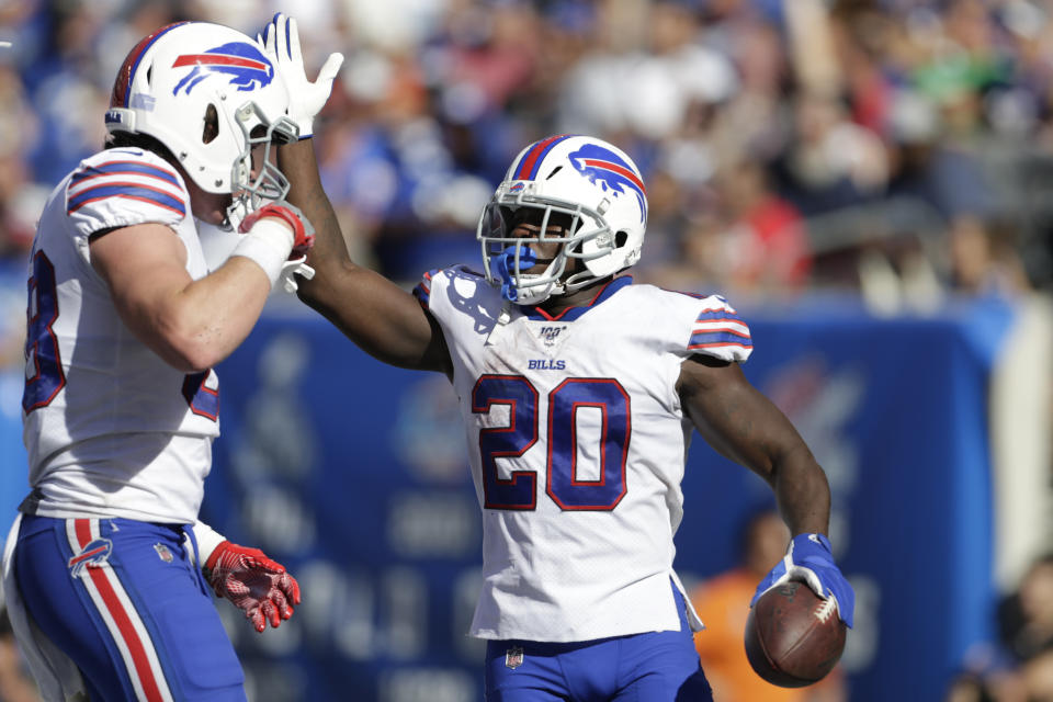 Buffalo Bills' Frank Gore (20) celebrates his touchdown during the second half of an NFL football game against the New York Giants, Sunday, Sept. 15, 2019, in East Rutherford, N.J. (AP Photo/Adam Hunger)