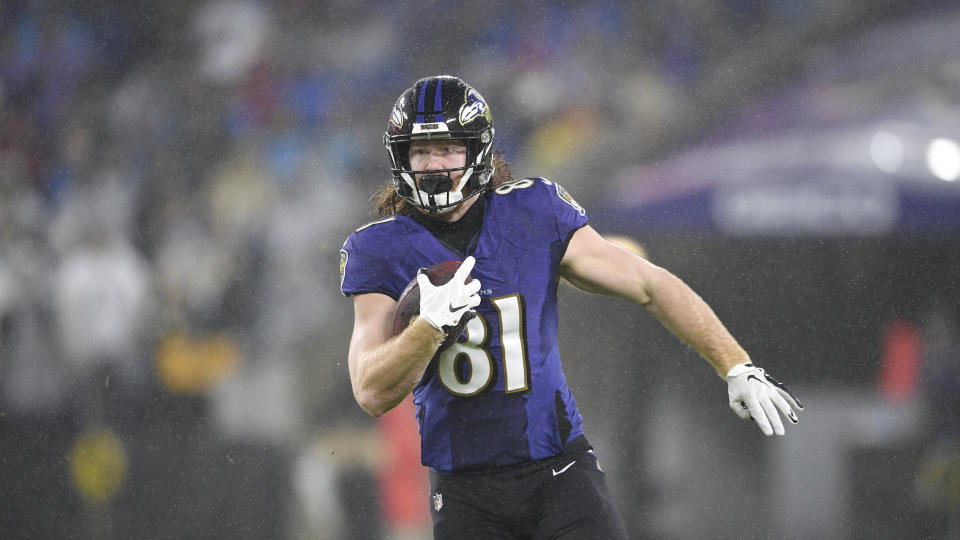 Baltimore Ravens tight end Hayden Hurst runs with the ball after making a catch against the Pittsburgh Steelers during the first half of an NFL football game, Sunday, Dec. 29, 2019, in Baltimore. (AP Photo/Nick Wass)