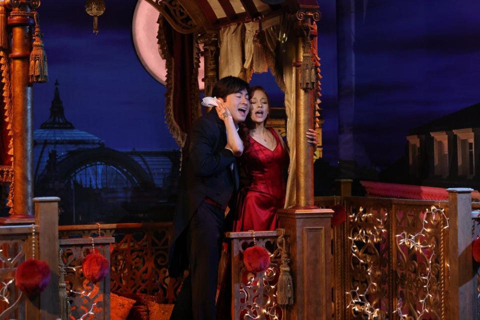 Bowen Yang, left, as Christian and Ariana Grande, right, as Satin during the "Moulin Rouge" skit on "Saturday Night Live" March 9.