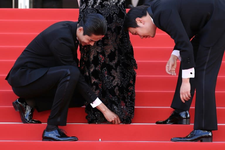 Japanese actress Erika Karata had to be rescued twice by her co-stars when she got her heel stuck in her dress