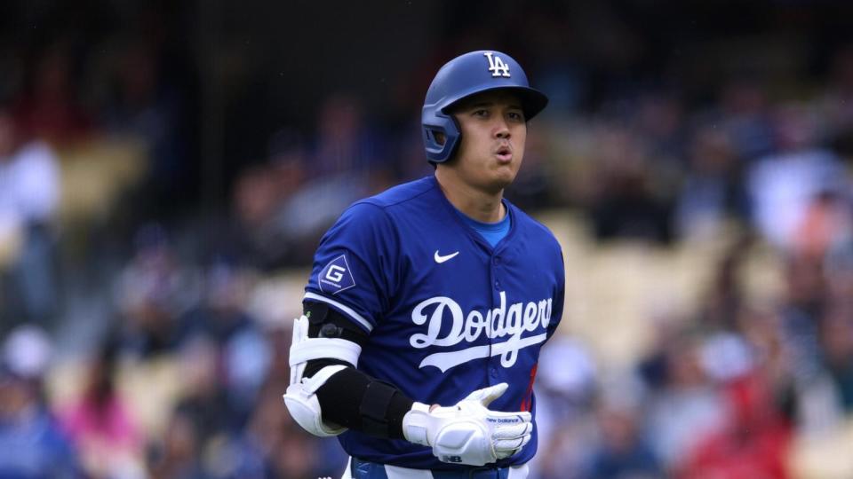 PHOTO: Shohei Ohtani reacts to his strikeout in the fourth inning during a preseason game against the Los Angeles Angels at Dodger Stadium on March 24, 2024 in Los Angeles. (Harry How/Getty Images)