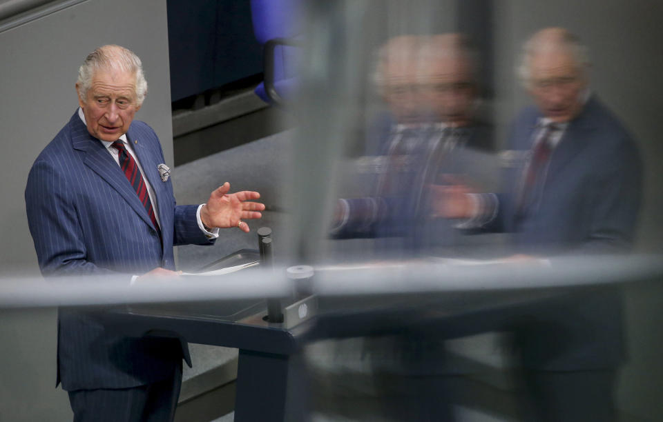 FILE - Britain's King Charles III speaks in the German parliament Bundestag on the second day of his trip to Germany in Berlin, Thursday, March 30, 2023. At an age when many of his contemporaries have long since retired, King Charles III is not one to put his feet up. The king will mark his 75th birthday on Tuesday, Nov. 14, 2023, by highlighting causes close to his heart. With Queen Camilla at his side, Charles will visit a project that helps feed those in need by redistributing food that might otherwise go to landfills. (Wolfgang Kumm/dpa via AP, File)