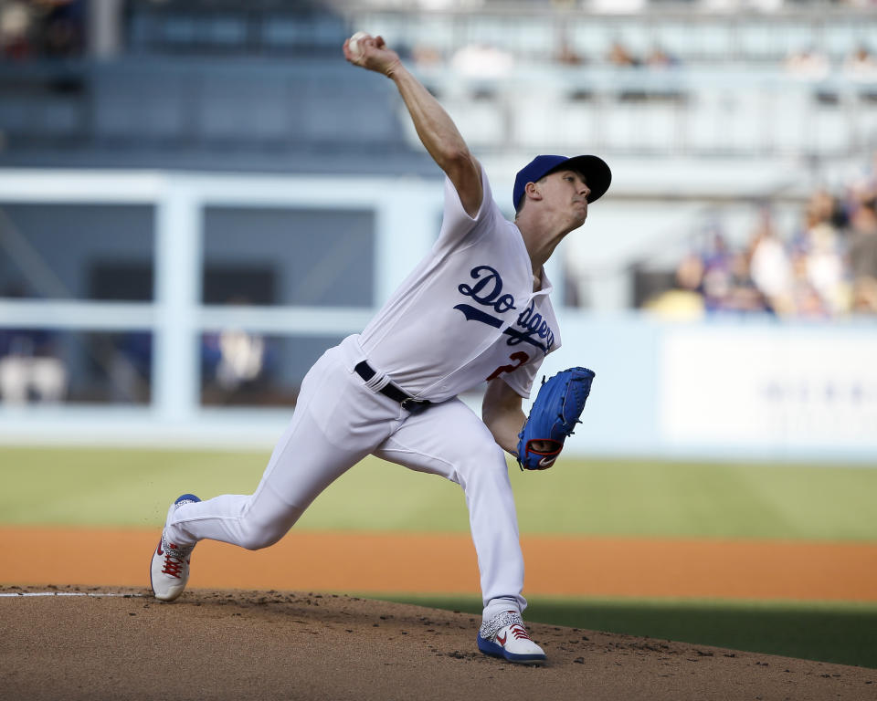 Los Angeles Dodgers starting pitcher Walker Buehler throws to a Chicago Cubs batter during the first inning of a baseball game in Los Angeles, Saturday, June 15, 2019. (AP Photo/Alex Gallardo)