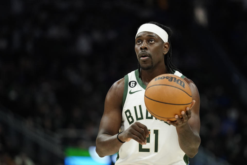 Milwaukee Bucks' Jrue Holiday shoots a free throw during the second half of an NBA basketball game against the Toronto Raptors Sunday, March 19, 2023, in Milwaukee. (AP Photo/Aaron Gash)