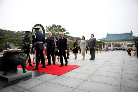 U.S. Vice President Mike Pence visits the National Cemetery in Seoul, South Korea, April 16, 2017. REUTERS/Kim Hong-Ji