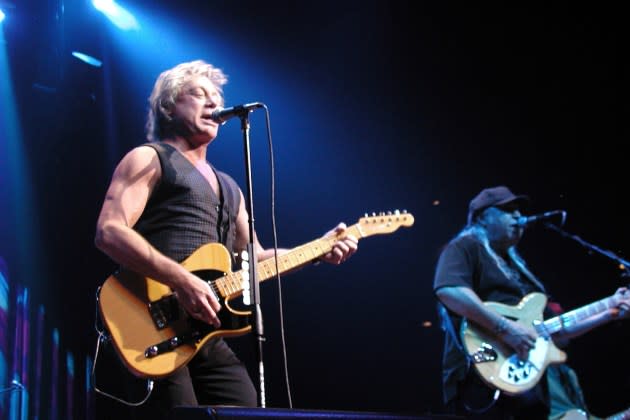 Eric Carmen, left, and Wally Bryson onstage with the Raspberries in 2005. Carmen resisted a reunion for years, but finally rejoined the power-pop icons. - Credit: Bobby Bank/WireImage/Getty