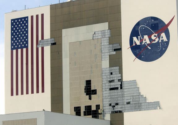 Kennedy Space Center's 500 foot tall Vehicle Assembly Building (VAB) was badly damaged by Hurricane Frances in 2004. About 800 of the 16'x 4' panels were ripped off the south side of the building as the storm made landfall near Ft. Pierce.