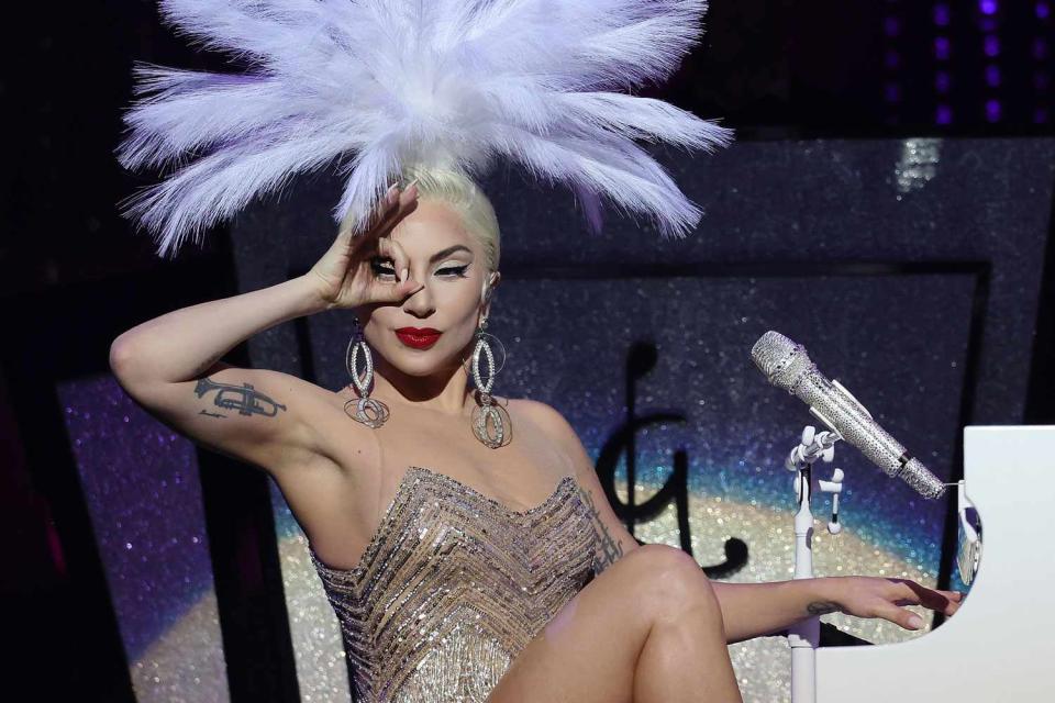 <p>Kevin Mazur/Getty</p> Lady Gaga performing in her Jazz & Piano Las Vegas residency in August 2023