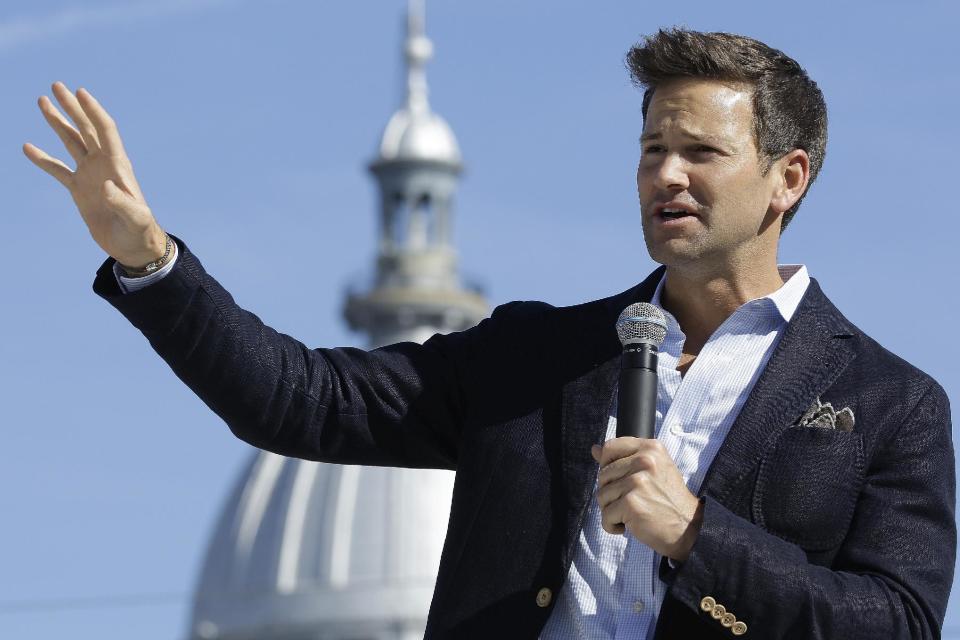 U.S. Rep. Aaron Schock, R-Ill., speaks in support of Republican gubernatorial candidate Bruce Rauner during a campaign rally outside the State Capitol in Springfield, Ill., Monday, Nov. 3, 2014. Rauner faces incumbent Democratic Gov, Pat Quinn in Tuesday&#39;s election. (AP Photo/Seth Perlman)