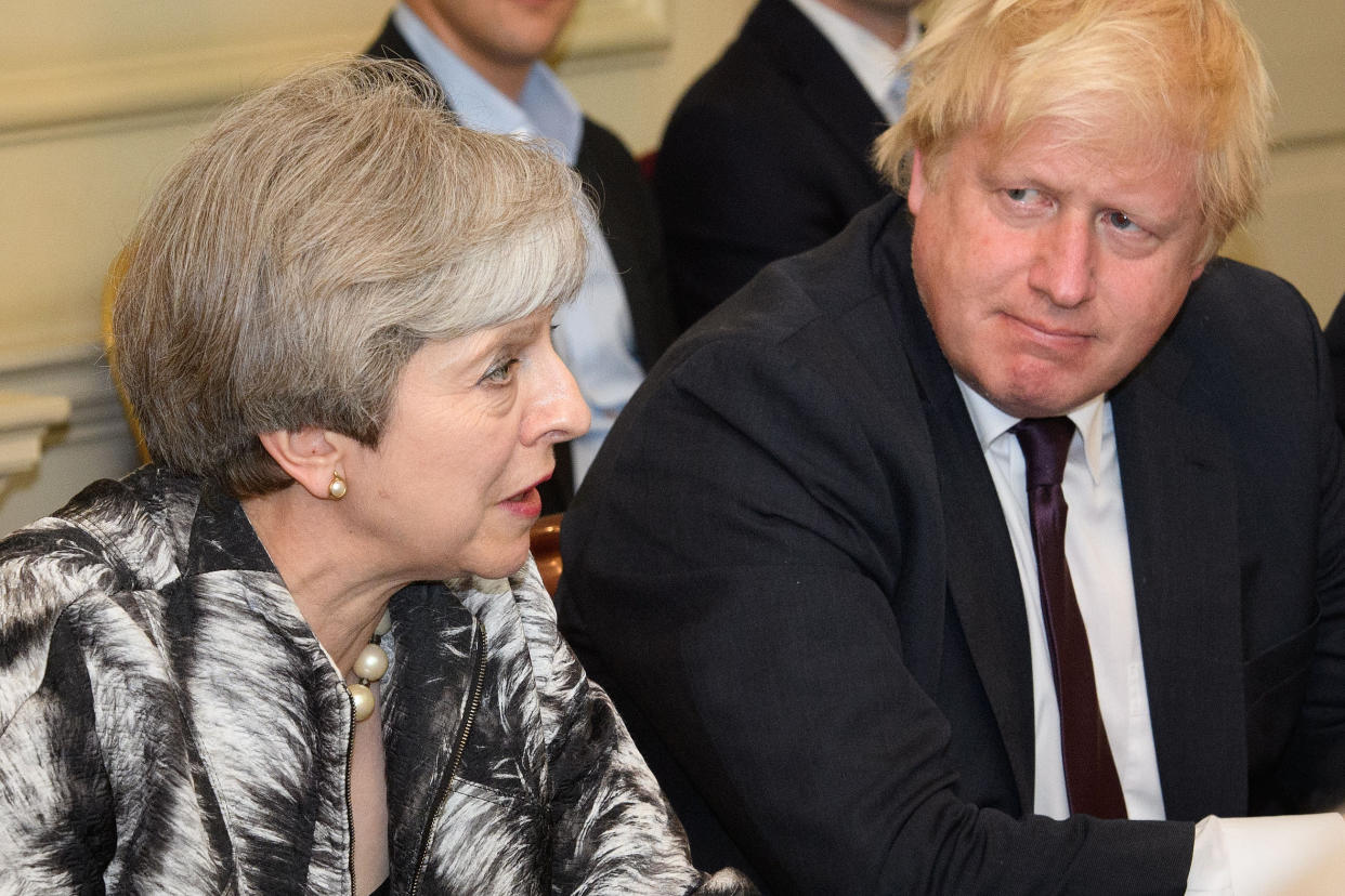 Prime Minister Theresa May with Foreign Secretary Boris Johnson as she holds the first Cabinet meeting since the General Election with her reshuffled team at 10 Downing Street in London.