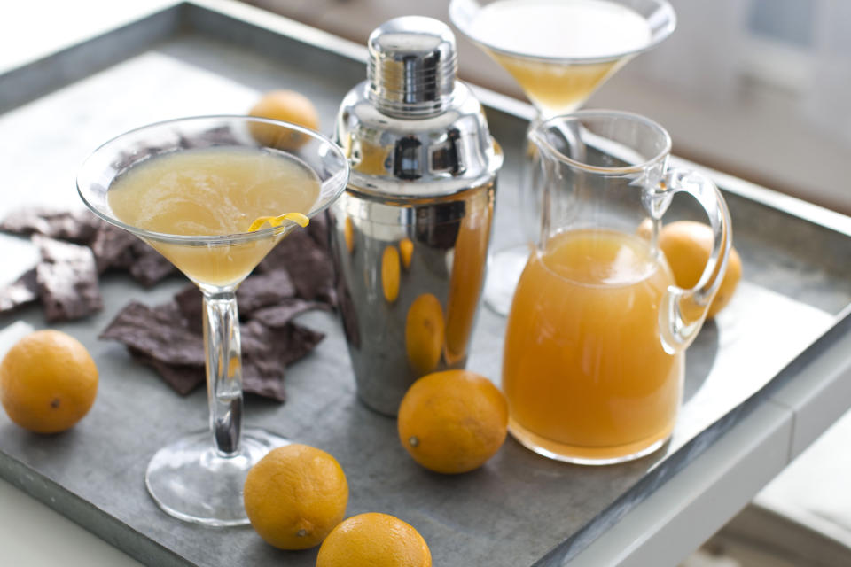 In this image taken on January 7, 2013, two glasses and a pitcher of Meyer lemon margaritas are shown in Concord, N.H. (AP Photo/Matthew Mead)