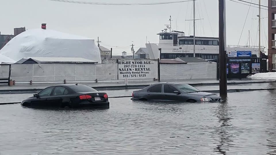 Cars sit in floodwaters caused by high tides in Portland, Maine, on Saturday, January 13, 2024. - Portland Police Department