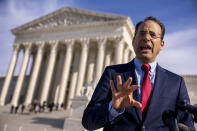 Colorado Attorney General Phil Weiser walks out of the Supreme Court in Washington, Monday, Dec. 5, 2022, after the Court heard the case 303 Creative LLC v. Elenis. The Supreme Court is hearing the case of a Christian graphic artist who objects to designing wedding websites for gay couples, that's the latest clash of religion and gay rights to land at the highest court. (AP Photo/Andrew Harnik)