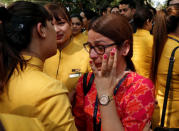 An employee of Jet Airways is consoled by her colleagues during a protest demanding to "save Jet Airways" in New Delhi, India, April 18, 2019. REUTERS/Adnan Abidi