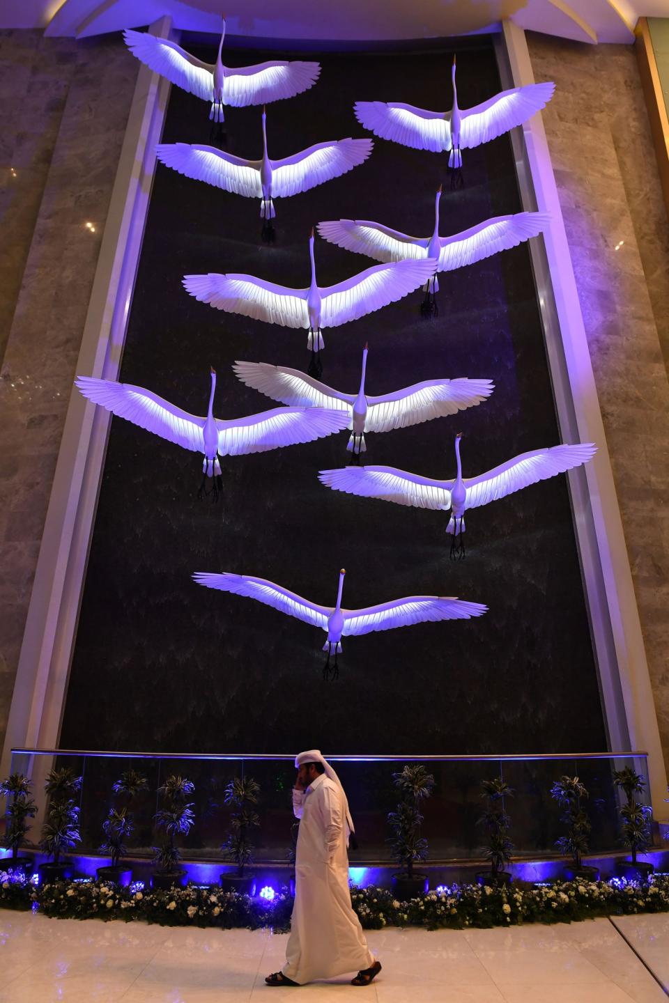 A man walks inside the Mall of Qatar