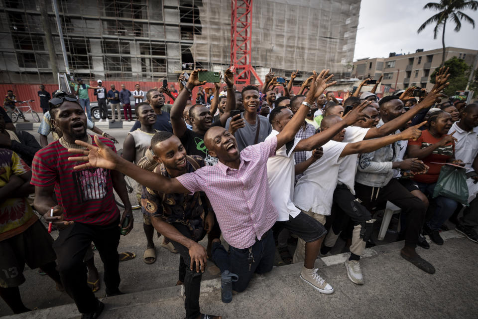 Party agents and supporters of presidential candidate Peter Obi of the Labour Party cheer as their candidate wins the count at a polling station near to the home of ruling party presidential candidate Bola Tinubu, in Lagos, Nigeria Saturday, Feb. 25, 2023. Voters in Africa's most populous nation are heading to the polls Saturday to choose a new president, following the second and final term of incumbent Muhammadu Buhari. (AP Photo/Ben Curtis)