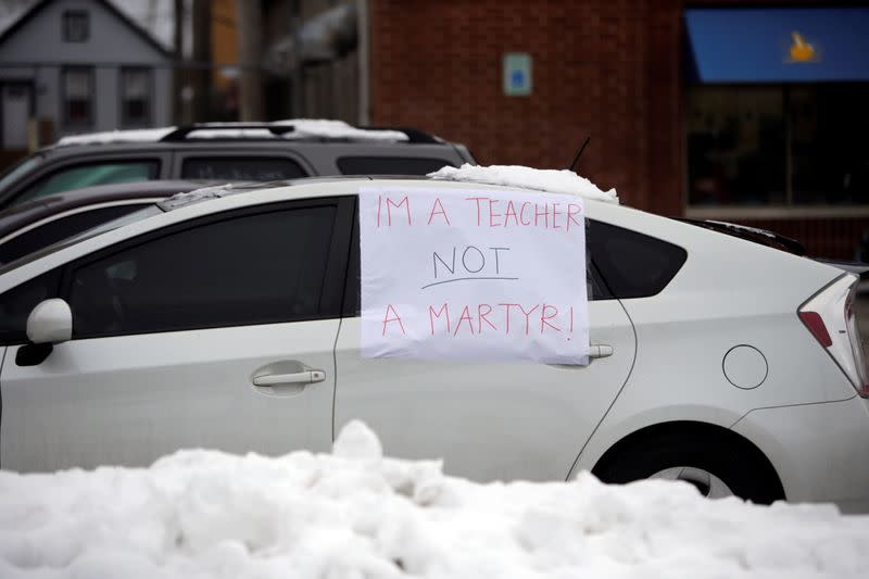 Supporters of the Chicago Teachers Union participate in a car caravan