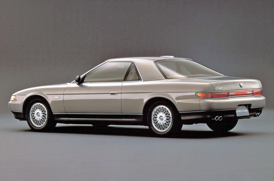 <p>The final Cosmo, introduced in 1990 and sold only in Japan, was a Mazda from its hat to its socks, but was marketed under the company’s short-lived Eunos brand. It was the first Wankel-engined production car with three rotors (the Mercedes C 111, as you’ll remember, was a prototype), and it had <strong>twin turbochargers.</strong></p><p>Maximum power was officially <strong>276bhp</strong>, though this may have been due to the ‘gentleman’s agreement’ among Japanese manufacturers at the time that none of them would quote a higher figure. The Cosmo was also the first production car to be equipped with GPS-enabled <strong>satellite navigation.</strong></p>