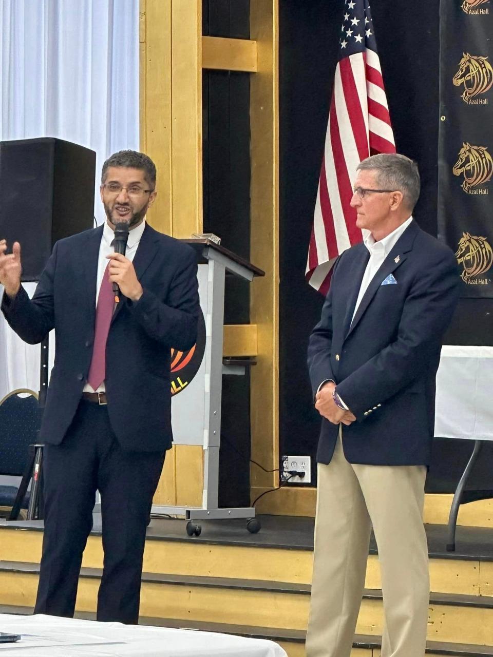 Hamtramck Mayor Amer Ghalib speaks alongside retired Lt. General Michael Flynn, former national security adviser (NSA) under former President Donald Trump, at Azal Hall in Hamtramck on Sept. 6, 2023.
