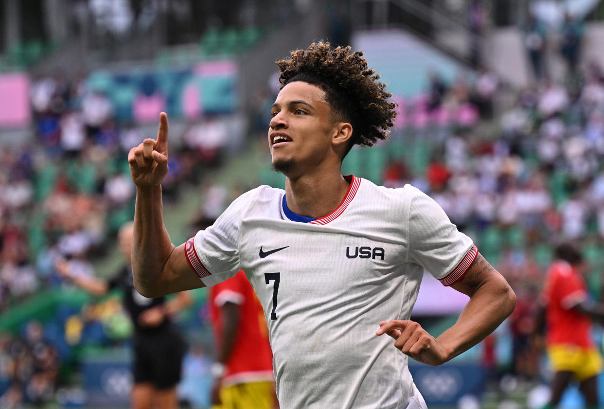 Kevin Paredes celebrates his first of two goals against Guinea. (Tullio M. Puglia/Getty Images)