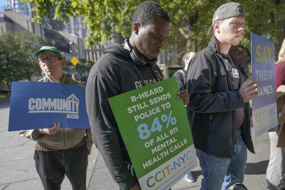 Activists participate in a rally to call for peer-led, non-police response to mental health crisis calls, Thursday, Sept. 29, 2022, in New York. The Associated Press has found that 14 of the 20 most populous U.S. cities are experimenting with removing police from some nonviolent 911 calls and sending behavioral health clinicians. Initiatives in major cities including New York, Los Angeles, Columbus, Ohio, and Houston had combined annual budgets topping $123 million as of June 2023. (AP Photo/Mary Altaffer)