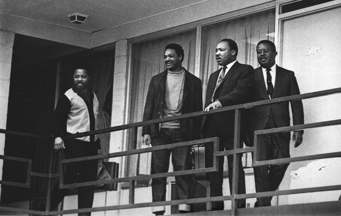 <p>Rev. Martin Luther King Jr. stands with other civil rights leaders on the balcony of the Lorraine Motel in Memphis, Tenn., a day before he was assassinated at approximately the same place, April 3, 1968. From left are Hosea Williams, Jesse Jackson, King, and Ralph Abernathy. (AP Photo) </p>