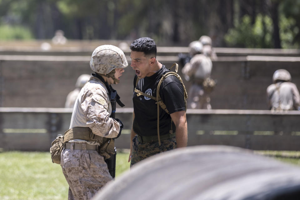 A U.S. Marine Corps tactical advisors trains a group of recruits during basic warrior training at the Marine Corps Recruit Depot, Wednesday, June 28, 2023, in Parris Island, S.C. (AP Photo/Stephen B. Morton)