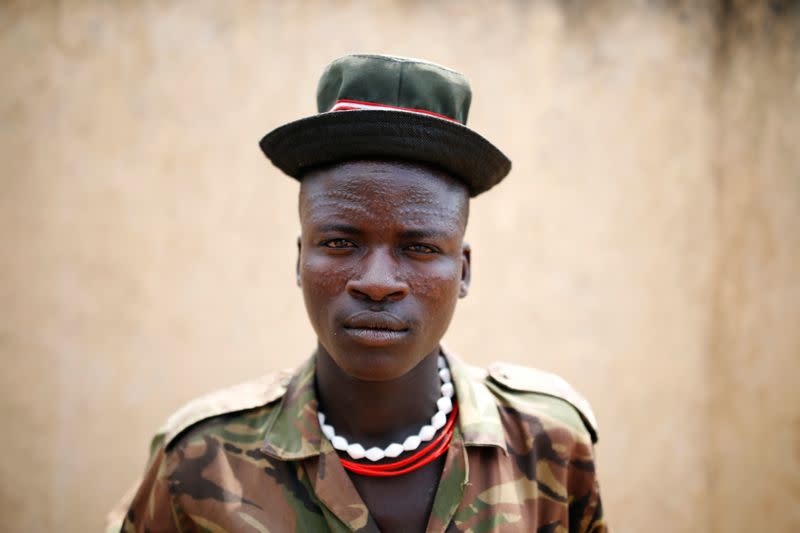 Esekon Louyaka, 20, from the Turkana tribe poses for a picture in the village of Lorengippi near the town of Lodwar, Turkana county