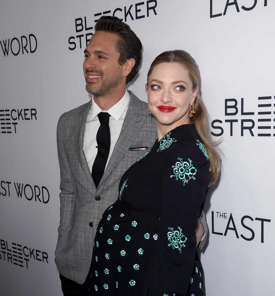 HOLLYWOOD, CA - MARCH 01:  Actors Thomas Sadoski (L) and Amanda Seyfried at the premiere of Bleecker Street Media's "The Last Word" at ArcLight Hollywood on March 1, 2017 in Hollywood, California.  (Photo by Kevin Winter/Getty Images)